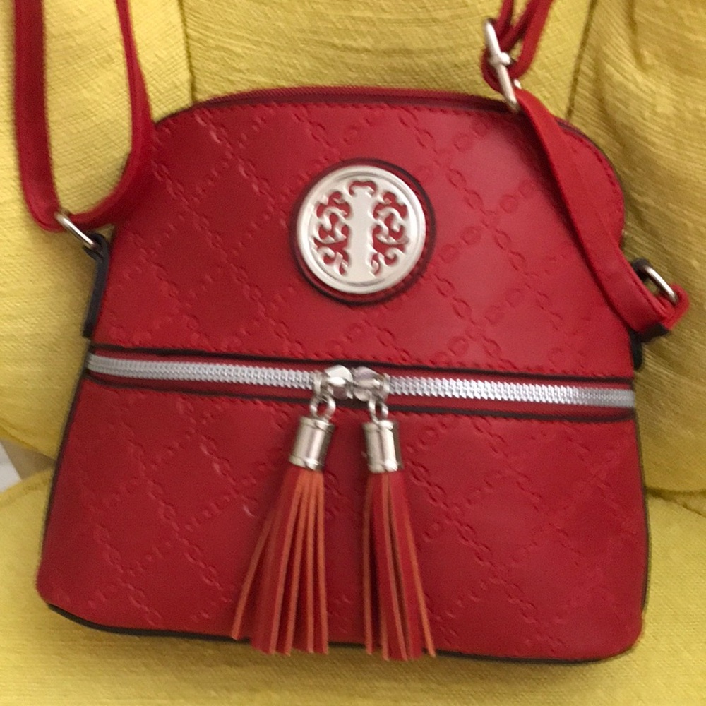 Red Crossbody Tassel Bag with Signature Medallion